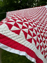 Load image into Gallery viewer, red “pinwheel” quilt
