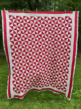 Load image into Gallery viewer, red “pinwheel” quilt
