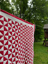 Load image into Gallery viewer, red “pinwheel” quilt
